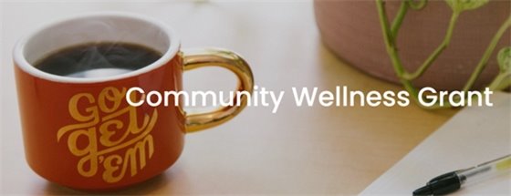 Picture of coffee cup and pen on desk 
