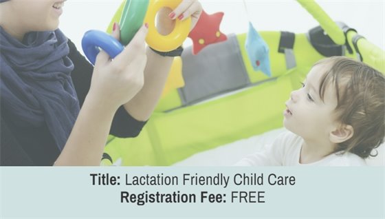 Adult holding up ring toys to an infant