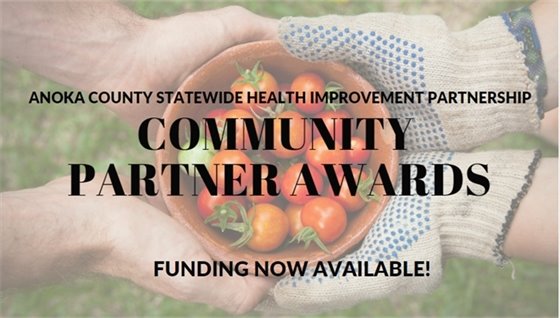 Hands Holding Tomatoes - Text saying "Anoka County Statewide Health Improvement Partnership Community Partner Awards Funding Now Available!