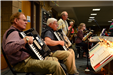A group of seniors play in a band