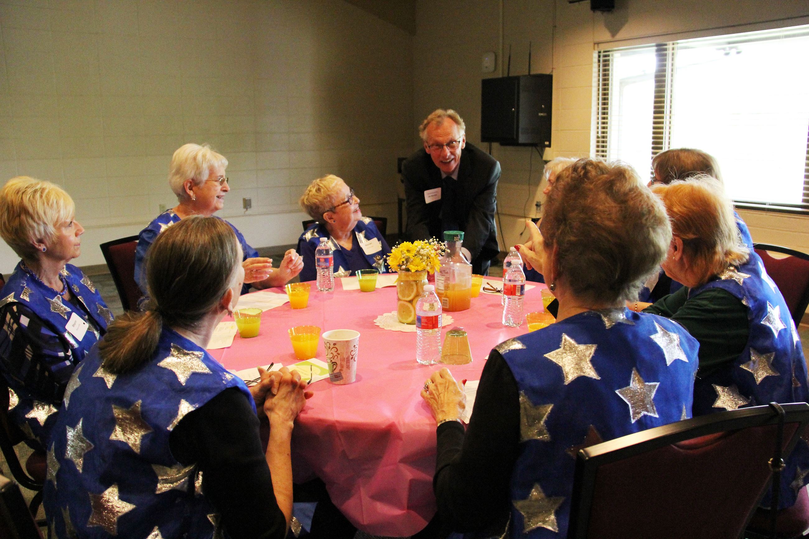 Commissioner Jim Kordiak visits with RSVP volunteers