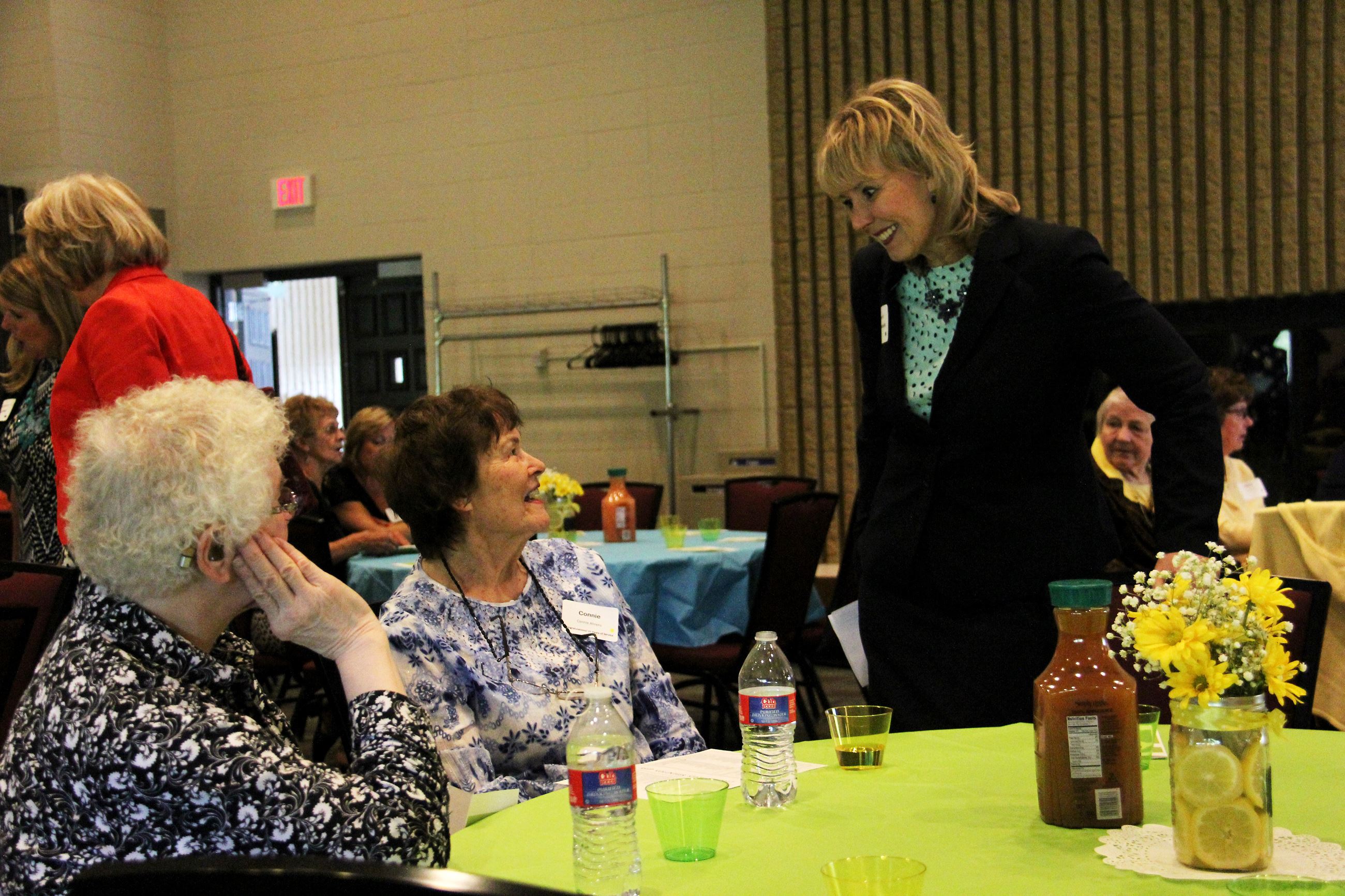 Commissioner Rhonda Sivarajah visits with RSVP event guests